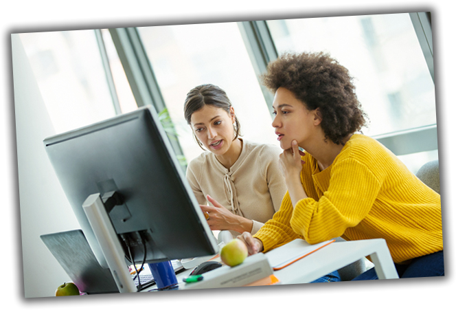 ladies reviewing software